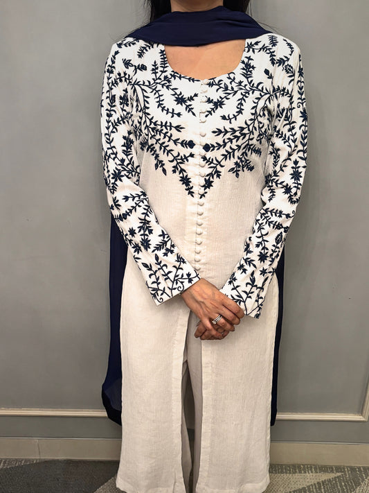 This ivory co-ord set is where purity of design meets quiet sophistication. Thoughtfully cut and impeccably finished, its softness is matched only by its grace. The flowing silhouette, muted palette, and tactile fabric speak to a woman who appreciates luxury not for its shine—but for its subtlety.
For afternoons in light-drenched rooms, slow evenings, and everything in between