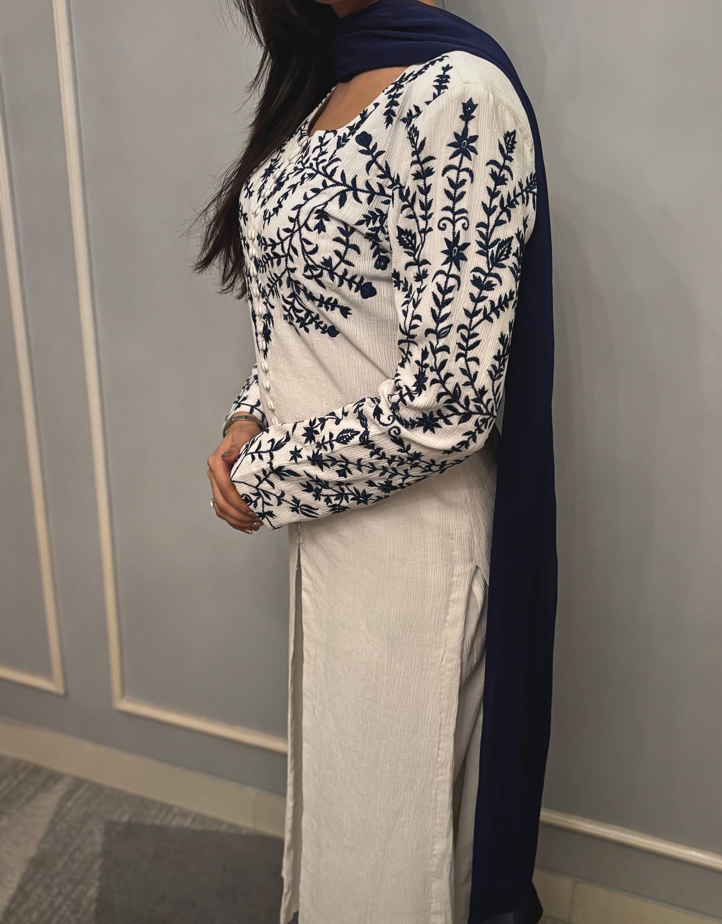 This ivory co-ord set is where purity of design meets quiet sophistication. Thoughtfully cut and impeccably finished, its softness is matched only by its grace. The flowing silhouette, muted palette, and tactile fabric speak to a woman who appreciates luxury not for its shine—but for its subtlety.
For afternoons in light-drenched rooms, slow evenings, and everything in between