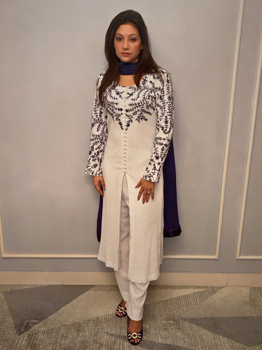 This ivory co-ord set is where purity of design meets quiet sophistication. Thoughtfully cut and impeccably finished, its softness is matched only by its grace. The flowing silhouette, muted palette, and tactile fabric speak to a woman who appreciates luxury not for its shine—but for its subtlety.

For afternoons in light-drenched rooms, slow evenings, and everything in between