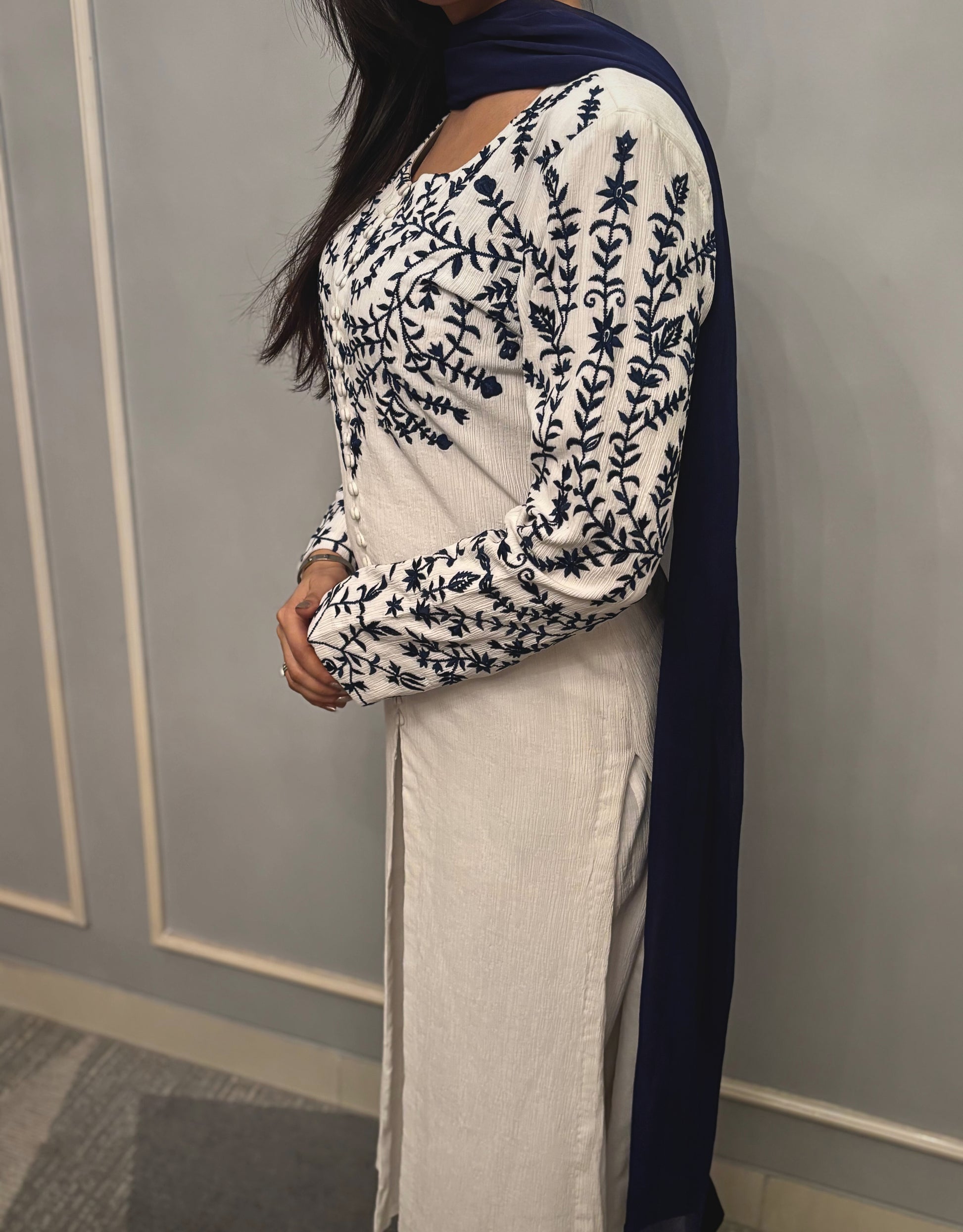 This ivory co-ord set is where purity of design meets quiet sophistication. Thoughtfully cut and impeccably finished, its softness is matched only by its grace. The flowing silhouette, muted palette, and tactile fabric speak to a woman who appreciates luxury not for its shine—but for its subtlety.

For afternoons in light-drenched rooms, slow evenings, and everything in between